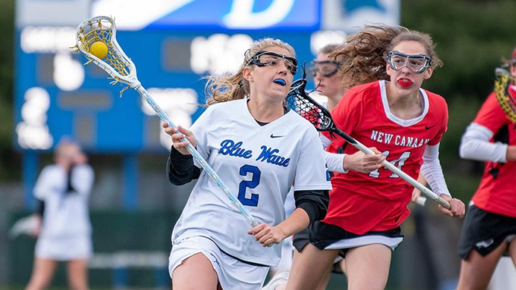 Darien Dominates New Canaan in Battle of Connecticut Titans