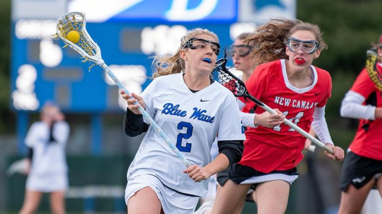 Darien Dominates New Canaan in Battle of Connecticut Titans
